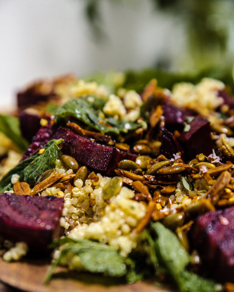 Close up image of beetroot, quinoa and mint